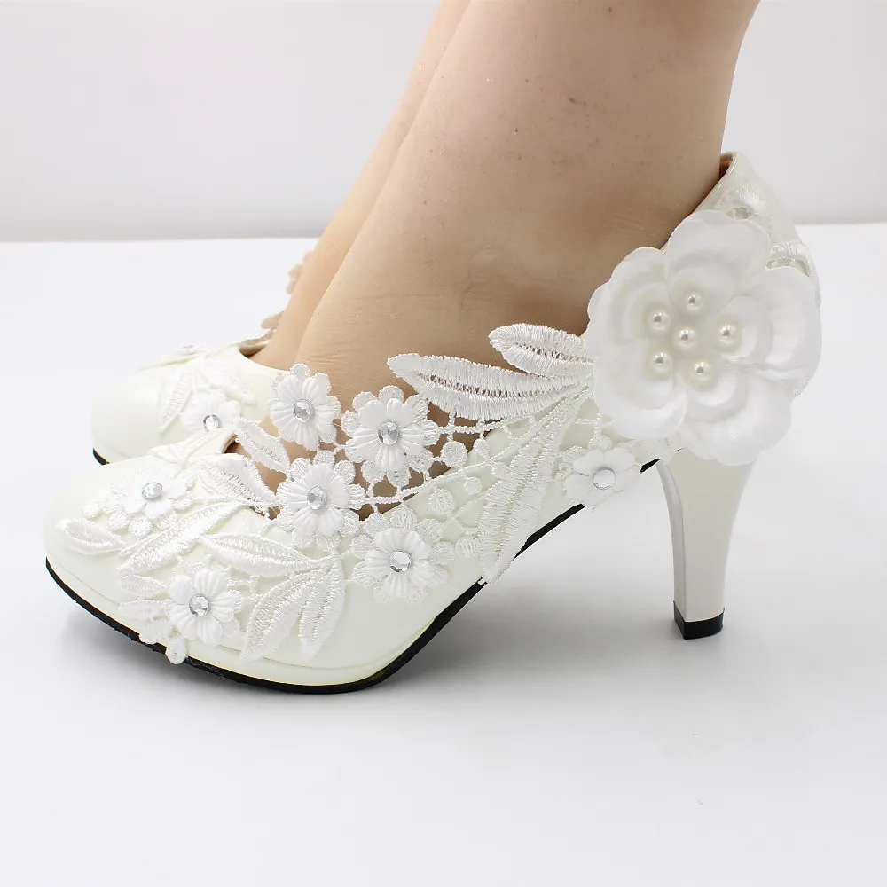 zfnwvd1669018486821.webp Women's White Wedding Heels – Lace Floral Embellishments with Pearl and Rhinestone Accents, Perfect for Brides and Special Occasions - Image 1